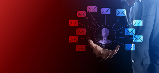 Male hand holding letter icon,email icons .Contact us by newsletter email and protect your personal information from spam mail. Customer service call center contact us.Email marketing and newsletter