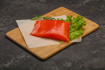 Salmon piece steak served rosemary