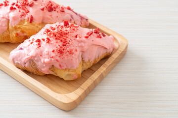 croissant with strawberry chocolate sauce