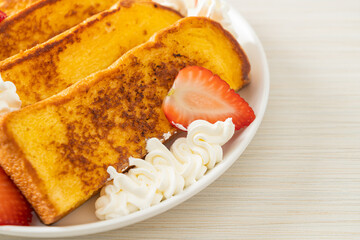 french toast with fresh strawberry and whipping cream