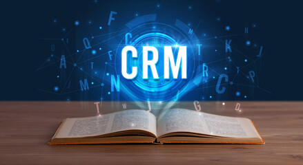 Technology abbreviation coming out from an open book