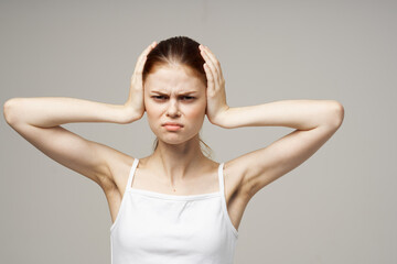 Fototapeta premium woman ear pain otitis media health problems infection light background