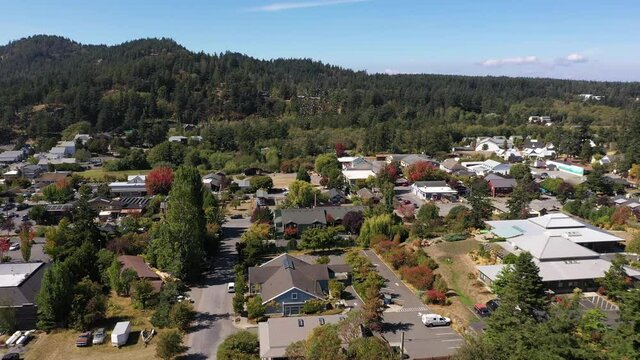 Cinematic 4K dolly in aerial drone footage of Eastsound village on Orcas Island in Washington