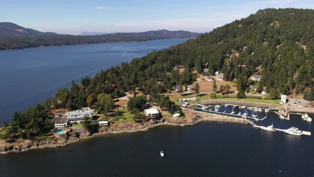 Cinematic 4K 360 aerial drone shot of Rosario Point, Cascade Bay, East Sound, Rosario Resort and Spa on Orcas Island, San Juan Islands in Washington