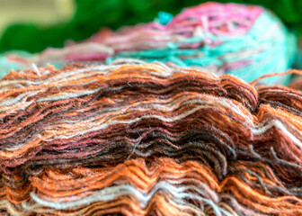 colorful, variegated, bright wool yarn fragments, knitting and handicraft concept