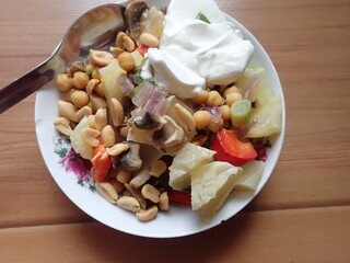 warm vegetable saladwith olives and mushrooms