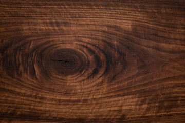 Walnut texture. Walnut wood plank texture background. Knotted walnut texture.