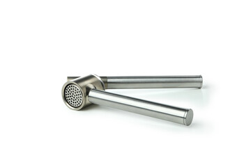 Metal garlic press isolated on white background