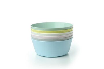 Colorful plastic bowls isolated on white background