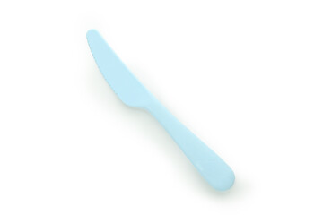 Single plastic knife isolated on white background