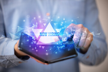 Businessman holding a foldable smartphone, business concept