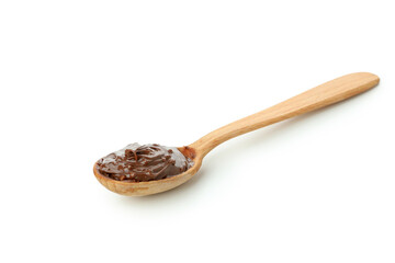 Spoon with chocolate paste isolated on white background