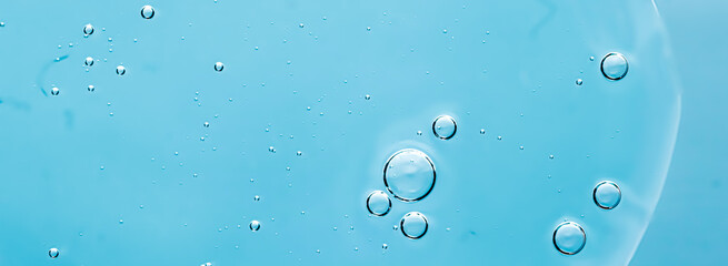 Blue water texture as aquatic background, nature and science concept, skincare cosmetics and hygiene macro closeup.