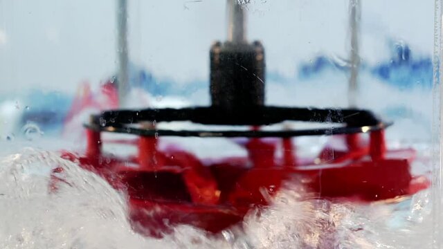 Rotation of a water turbine in water