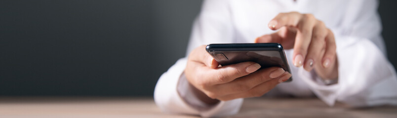 woman is using her smart phone