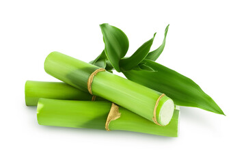 Green bamboo with leaves isolated on white background with clipping path and full depth of field - obrazy, fototapety, plakaty