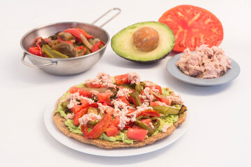 Fajitas with tortilla mix tomato, pepper, tuna onion and avocado on white background