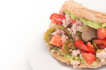 Mexican food- integral fajita with tuna, pepper, tomato and avocado  -  tradicional plate of México.