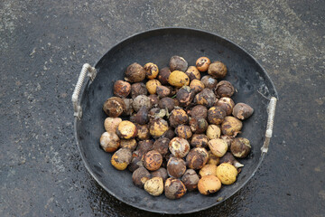 Avocado seeds placed in a basket ready to be planted, Butterfruit seeds for planting