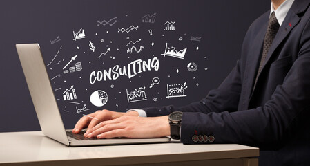 Businessman working on laptop, business concept