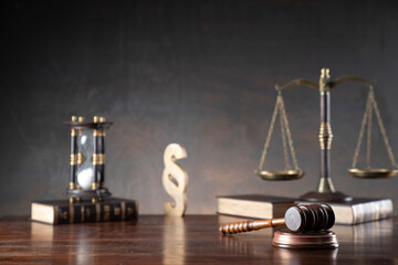Law and justice concept. Law symbols composition: judge’s gavel, legal code and scale.
