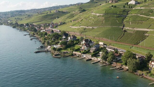 High angle view of train driving through beautiful Swiss landscape