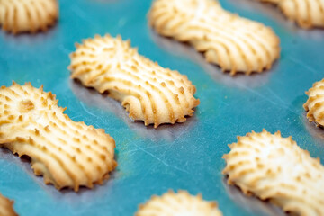 Shortbread.  Production of shortbread cookies at a confectionery factory.  Shortbread cookies on a metal rack after baking in the oven.