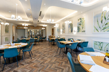 Interior of an empty modern hotel restaurant