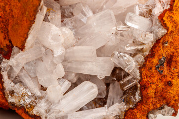 Macro mineral stone crystals Hemimorphite rock on a white background