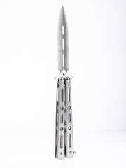 metal folding toy not sharpened knife on a white background