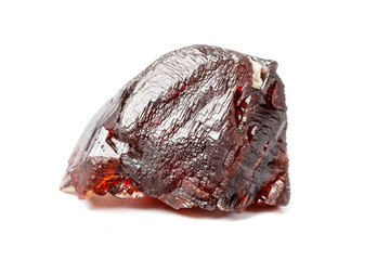 Macro mineral stone Garnet Spessartine on a white background