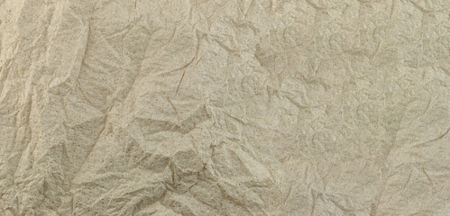 Fototapeta na wymiar Texture of wrinkled brown paper.