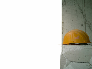 safety helmet with concrete wall on white background, space on left area, Safety for working at height,