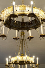 Lead crystal chandelier detail close up view inside luxury estate home house museum palace with...