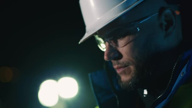 Male contractor giving instructions via radio