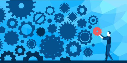 Uomo che sistema ingranaggi di vari tipi © Hurca!