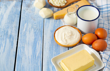 dairy products on blue wooden surface
