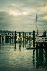 Obraz premium Vintage photo of Russel Wharf on a stormy day. Low tide