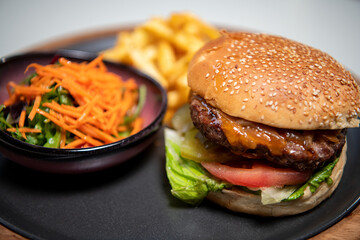 Craft beef burger and French fries 