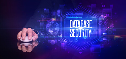 hand holding wireless peripheral, cyber security concept