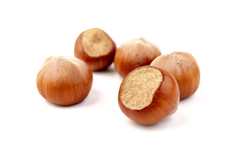 Group of hazelnuts, isolated on white background