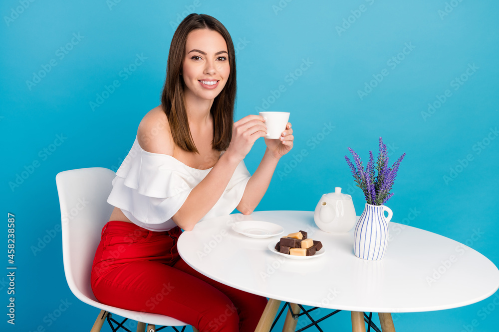 Sticker photo of pretty sweet lady wear off-shoulders shirt sitting cafeteria drinking tea eating sweets smi