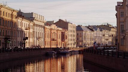 Naklejka na ściany i meble Shot of classic embankment in historic center of european city. 