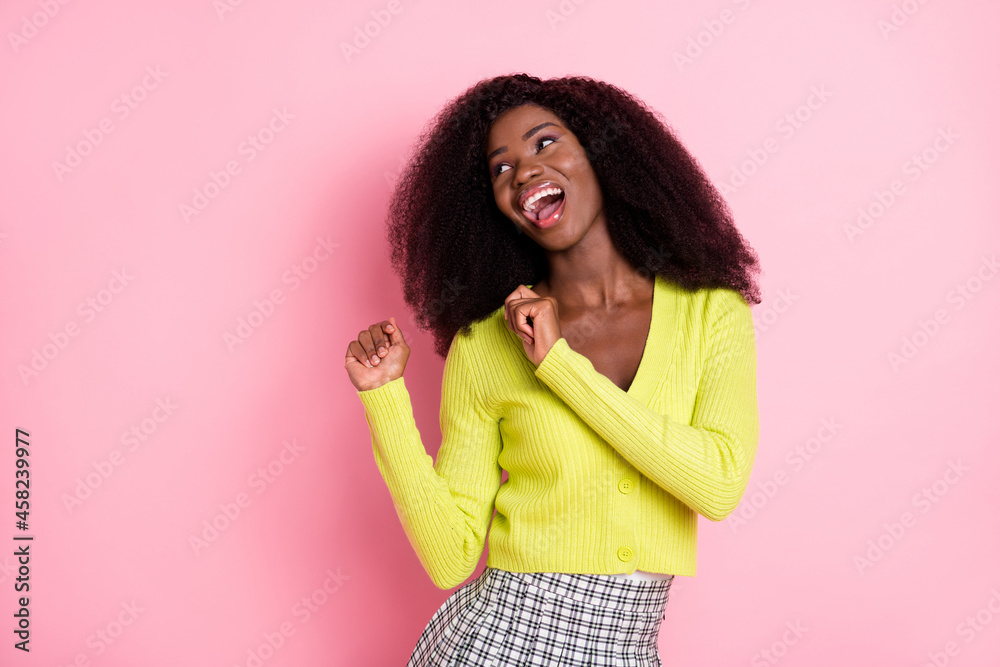 Wall mural Photo of positive dark skin person enjoy partying look empty space open mouth isolated on pink color background - Wall murals