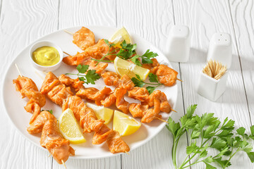juicy grilled salmon kebabs with lemon and parsley