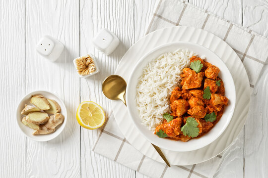 butter chicken, curry of spicy chicken with rice