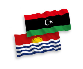 National vector fabric wave flags of Republic of Kiribati and Libya isolated on white background. 1 to 2 proportion.