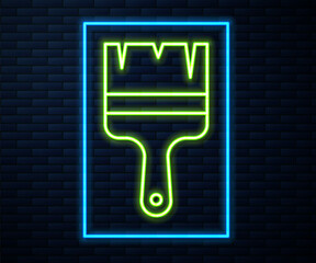 Glowing neon line Paint brush icon isolated on brick wall background. Vector