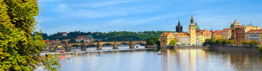 Fototapeta na wymiar View of Charles Bridge and panoramic of Prague , Czech Republic. popular tourist attraction. Travel and sights of city breaks. landmarks, travel guide and postcard. Prague banner