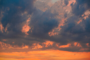 Dramatic sky at sunset with red, yellow and orange colors.